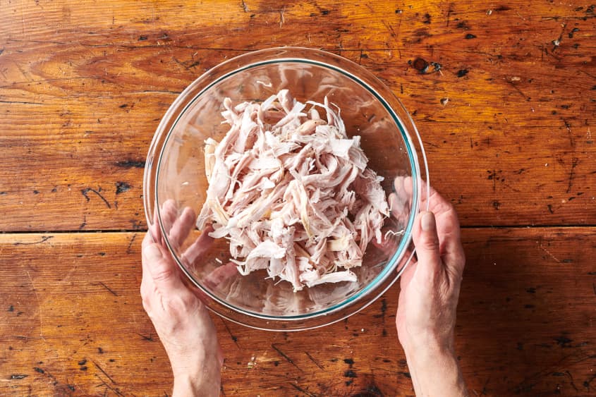 Shredded turkey breast in bowl.