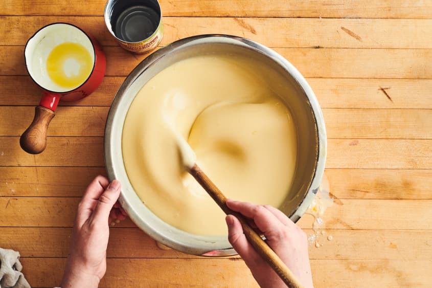 someone is stirring together hawaiian butter in a pot