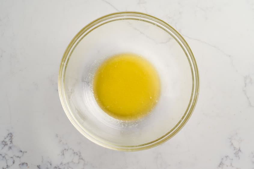 oil in a bowl with salt and butter
