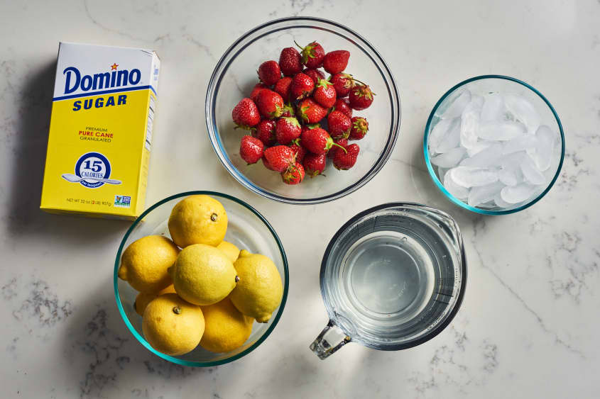 ingredients to strawberry lemonade on a table