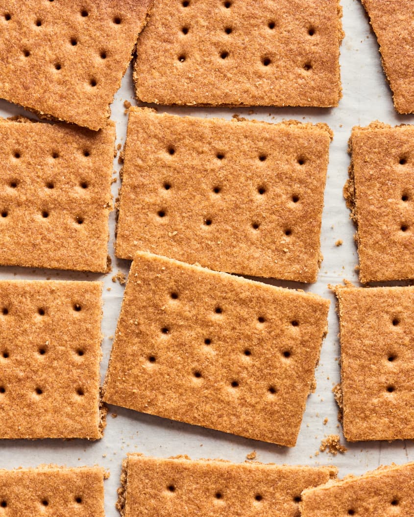 graham crackers sliced on parchment paper