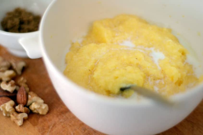 A close-up shot of polenta in a bowl
