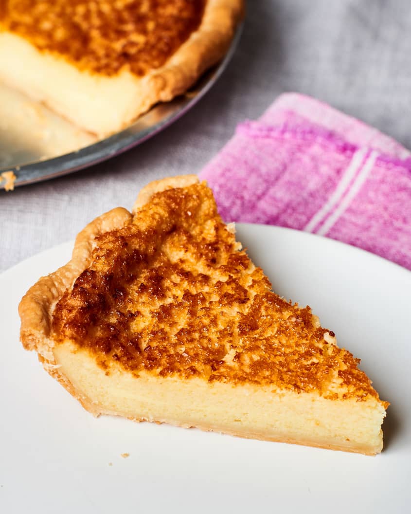 A slice of buttermilk chess pie on a plate