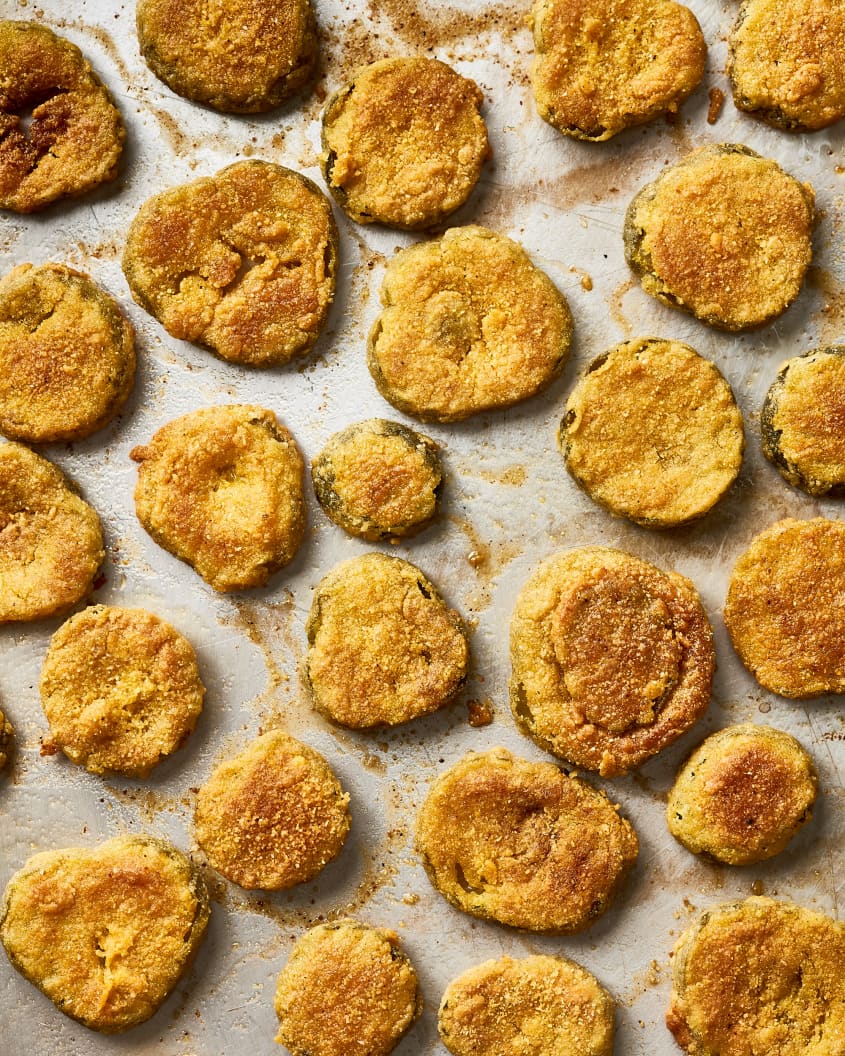 Oven-fried pickles on a baking sheet