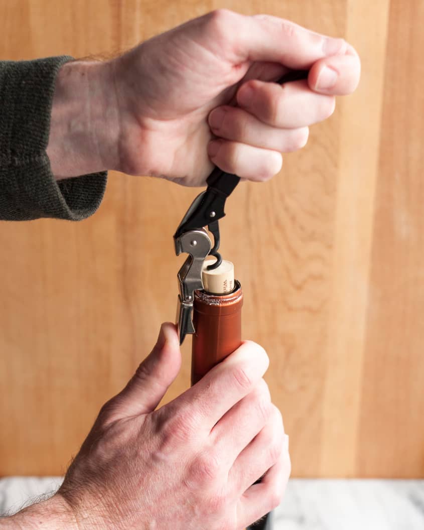 How To Open a Bottle of Wine Using a Wine Key Corkscrew The Kitchn