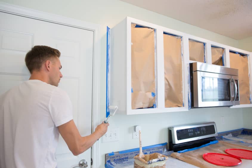 How To Paint Wood Kitchen Cabinets with White Paint | The Kitchn