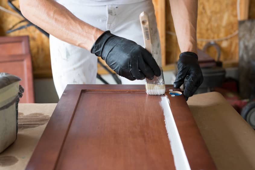 How To Paint Wood Kitchen Cabinets with White Paint | The Kitchn
