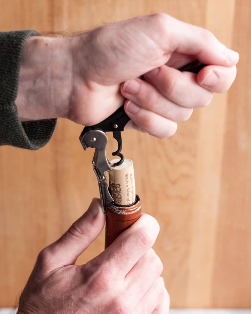 How To Open a Bottle of Wine Using a Wine Key Corkscrew The Kitchn