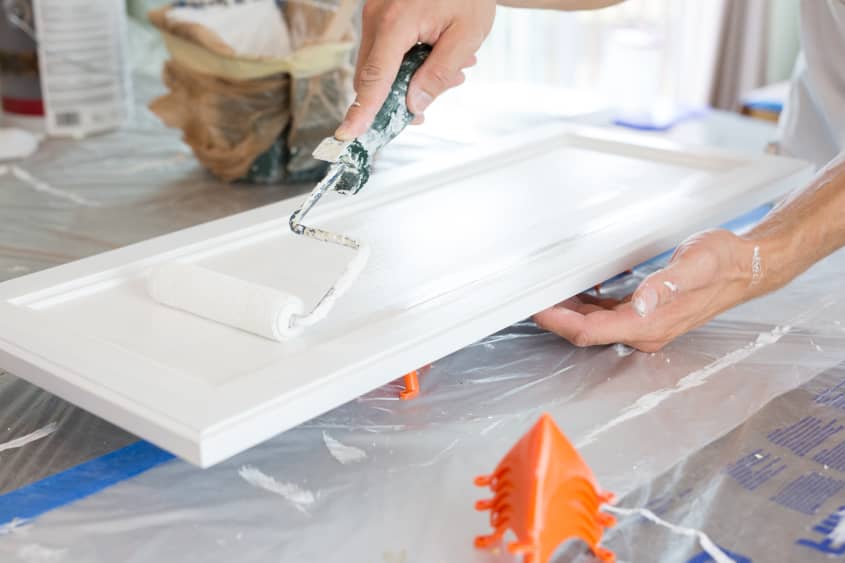 How To Paint Wood Kitchen Cabinets with White Paint | The Kitchn