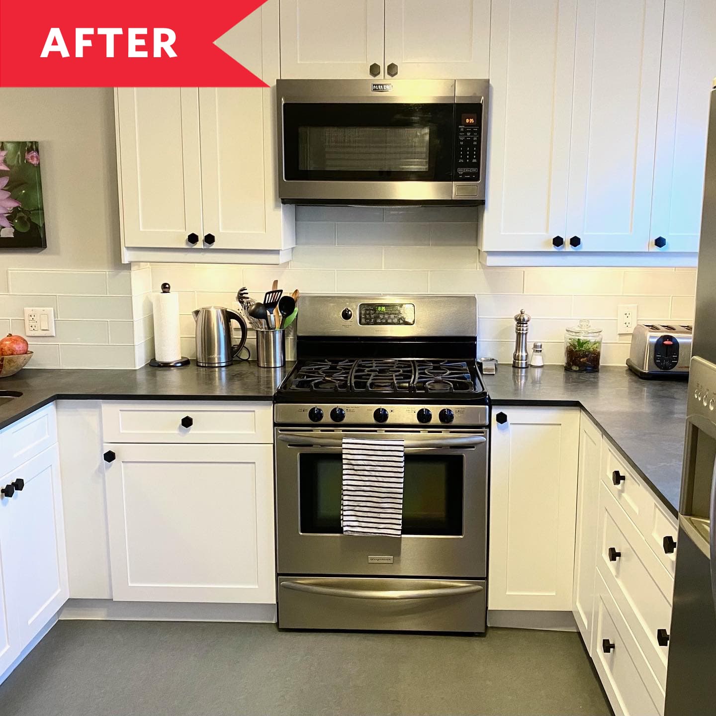 After: Kitchen with white cabinets and backsplash and stainless steel appliances