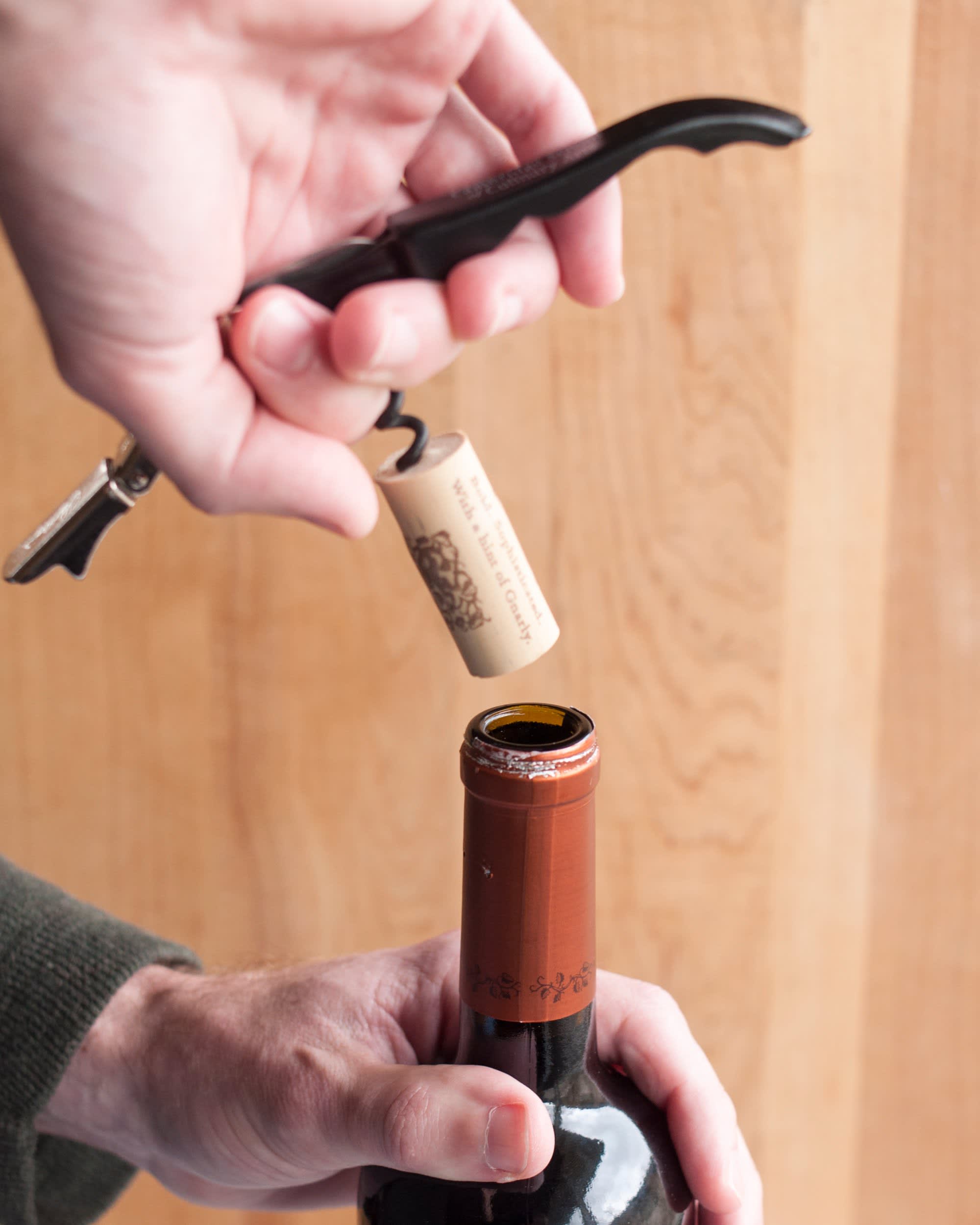 How To Open A Bottle Of Wine Using A Wine Key Corkscrew Kitchn