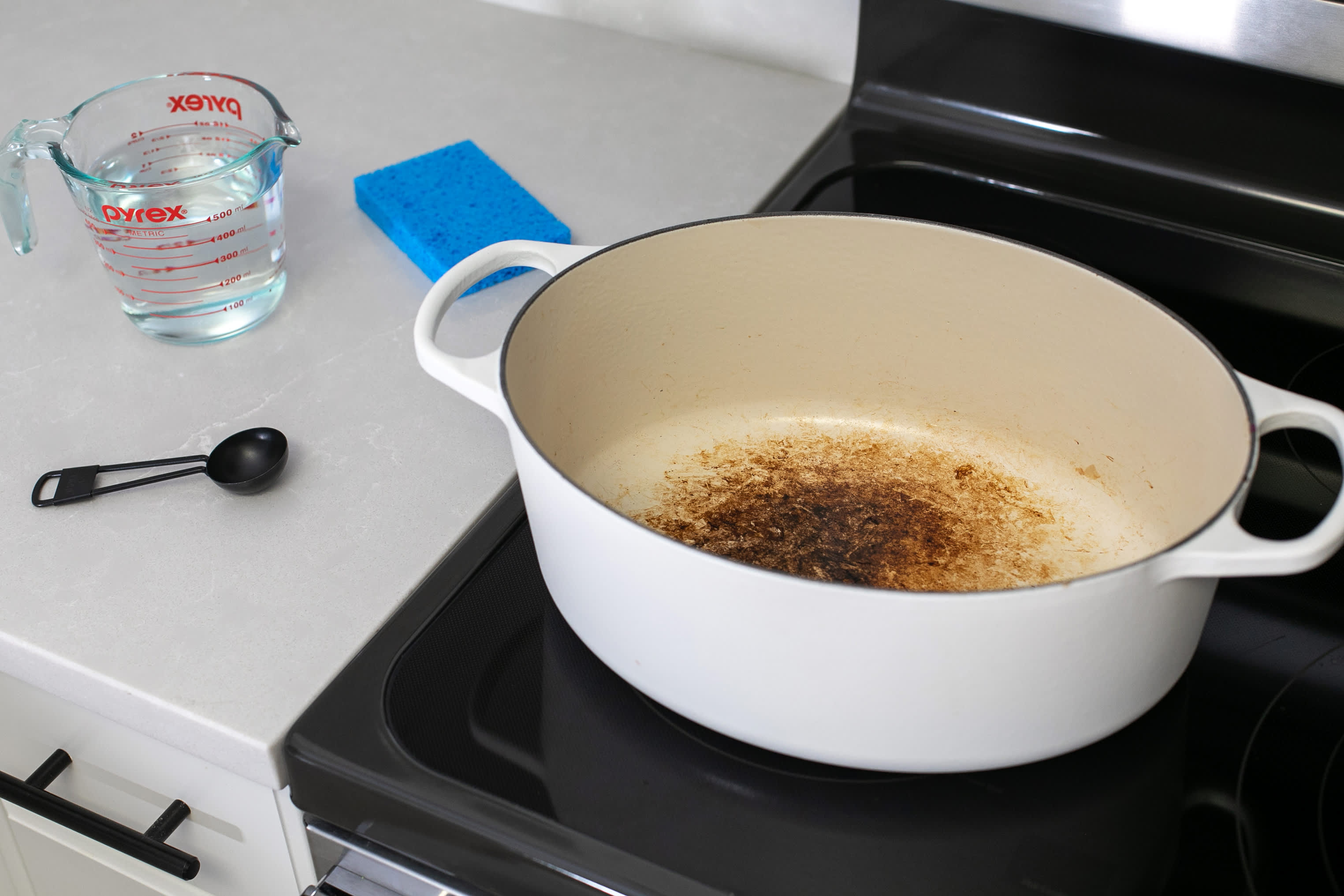 Cleaning Cast Iron Pot with Baking Soda.