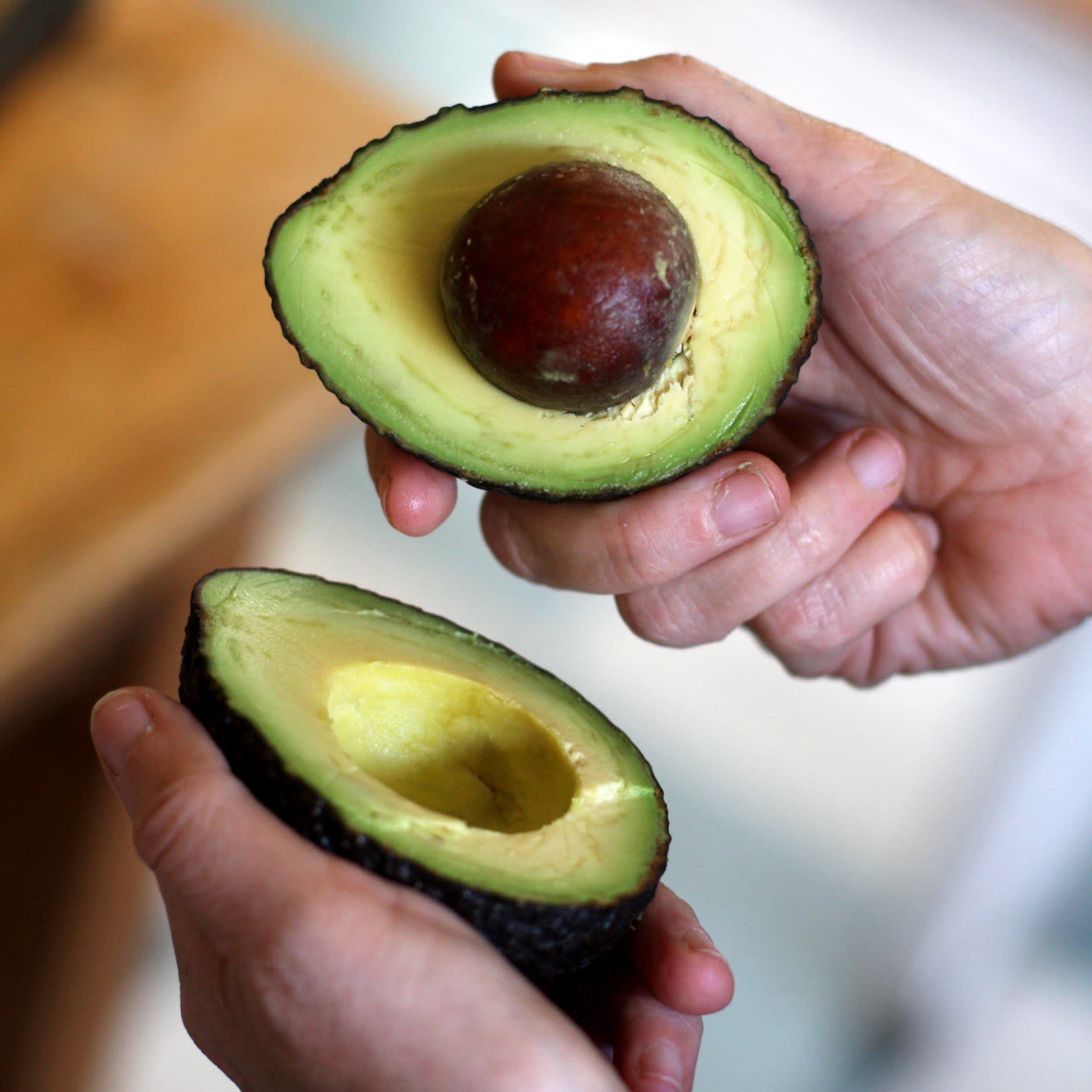 How To Remove An Avocado Pit With A Chef S Knife Kitchn