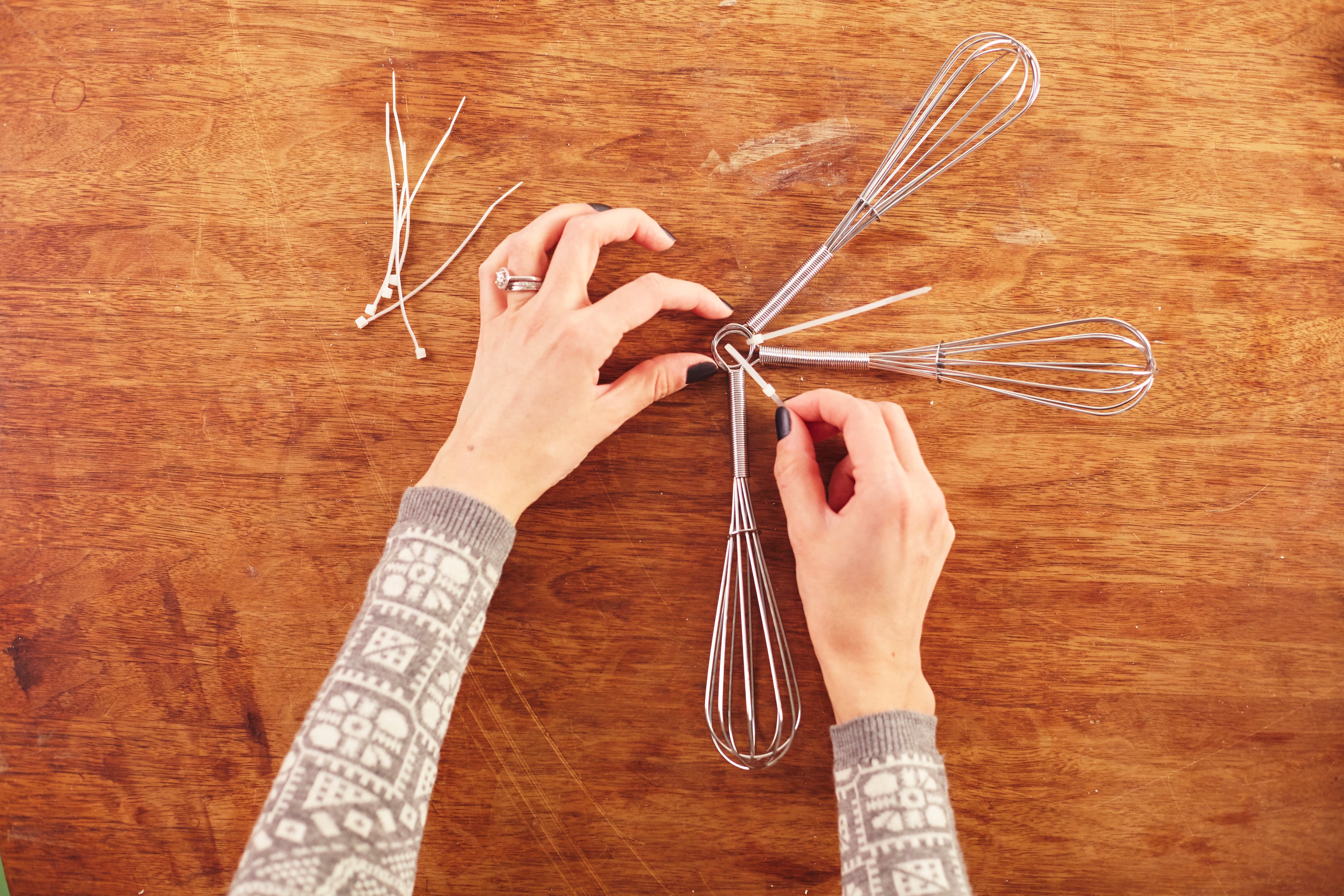 how-to-make-a-christmas-tree-topper-out-of-whisks-kitchn