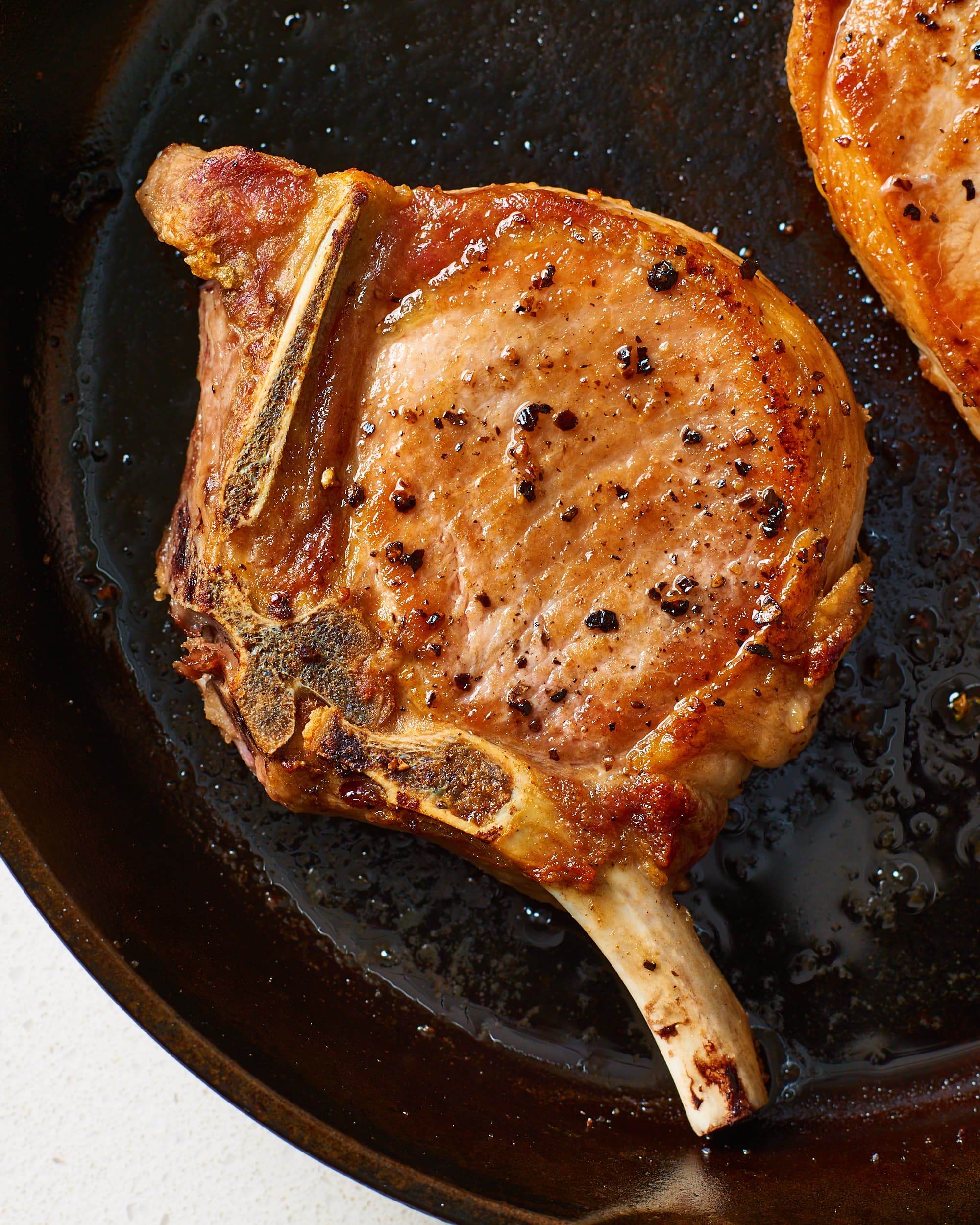 How To Cook Tender Juicy Pork Chops Every Time Kitchn 