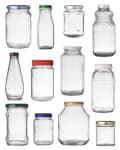 Various empty glass jars with different shapes and colored lids arranged in rows.