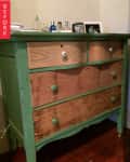 Green wooden dresser with mismatched knobs, partially sanded drawers, and photos on top, labeled "Before."