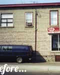 Two-story stone building with "Fair Mart" and "KitKat" signs, blue van parked in front, and a small tree on the right.