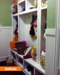 Cluttered mudroom with white cubbies, bags, and assorted items on shelves and hooks.