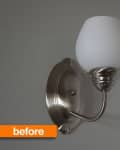 Wall-mounted sconce with a brushed nickel finish and frosted glass shade, labeled "before" in orange.