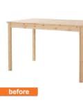 Simple wooden dining table with four legs and a rectangular top.