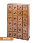 Wooden card catalog cabinet with 25 drawers and metal label holders.