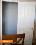 Empty closet with open white door and wooden chair in foreground.