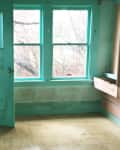 Before: a dingy bright teal room that looks neglected and like it hasn't been used in years