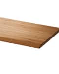 Rectangular wooden cutting board with a smooth finish.