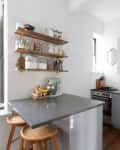 a white and gray industrial style kitchen