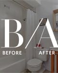 Bathroom renovation with white tiles, modern sink, wooden vanity, and decorative mirror.