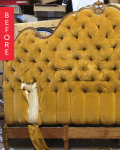 Tufted mustard yellow headboard with ornate top detail, showing signs of wear and tear.