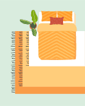 Top view of a bed with orange bedding, two pillows, a small plant, and a striped rug underneath.