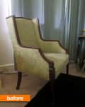 Vintage armchair with floral upholstery and wooden frame in a room with gray curtains.