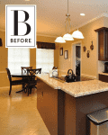 Kitchen with dark wood cabinets, granite countertops, stainless steel appliances, and a dining table with chairs.
