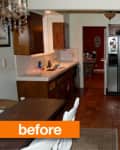 Kitchen with dark wood cabinets, white countertops, tile floor, and a small pink table with chairs.