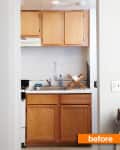 Small kitchen with wooden cabinets, stainless steel sink, dish rack, and soap bottle, labeled "before."