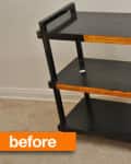 Three-tier black metal utility cart with orange accents on carpeted floor, labeled "before."