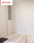 Empty room with beige carpet, white walls, a drop cloth on the floor, and an electrical panel on the left wall.