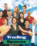 Group of people smiling with tools, paint roller, and "Trading Spaces" text against a cloudy sky.