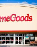 HomeGoods store entrance with red signage, glass doors, and shopping carts outside.