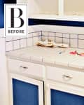 Kitchen counter with white tile, cleaning supplies, iced coffee, and dish towel near sink, labeled "Before."