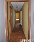 Narrow hallway with yellow walls, terracotta tile floor, and wooden door frames, labeled "BEFORE."