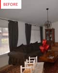 Living room with dark sectional, tan sofa, red heart balloons, wooden coffee table, and wall-mounted TV.