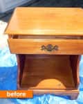 Wooden nightstand with a single drawer and open shelf, placed on a blue tarp, labeled "before."