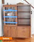 Wooden hutch with glass doors taped, shelves, and drawers, labeled "before."