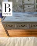 Distressed blue console table with six drawers on wooden floor, labeled "Before."