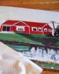 Partially covered painting of a red house by a pond, with "BEFORE" text in the corner.