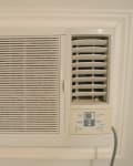 Wall-mounted air conditioner with control panel and vent, labeled "Before" on the left side.