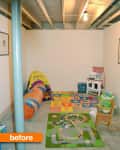 Basement playroom with colorful play mats, toy kitchen, and tunnel.